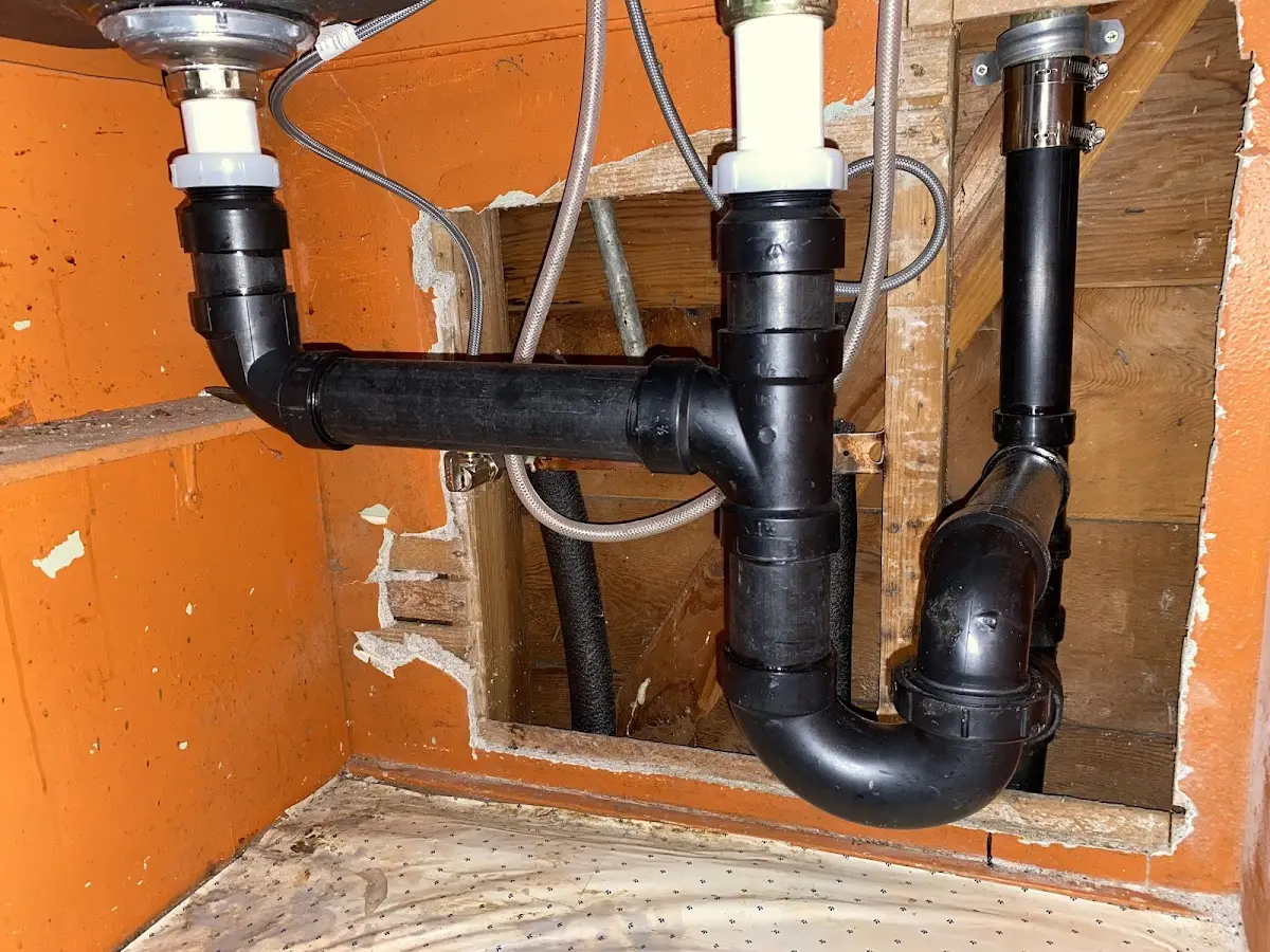 Professional Garbage Disposal Repair equipment and tools on the job in Mattawa